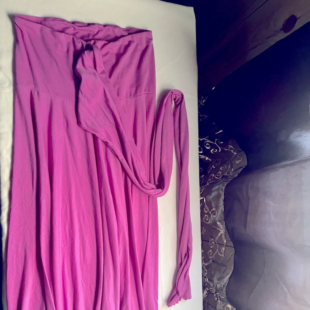 Virginia Beach design , tube top dress with wrap around tie belt .